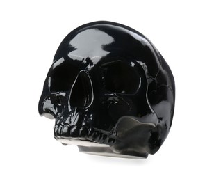Photo of Black glossy human skull isolated on white
