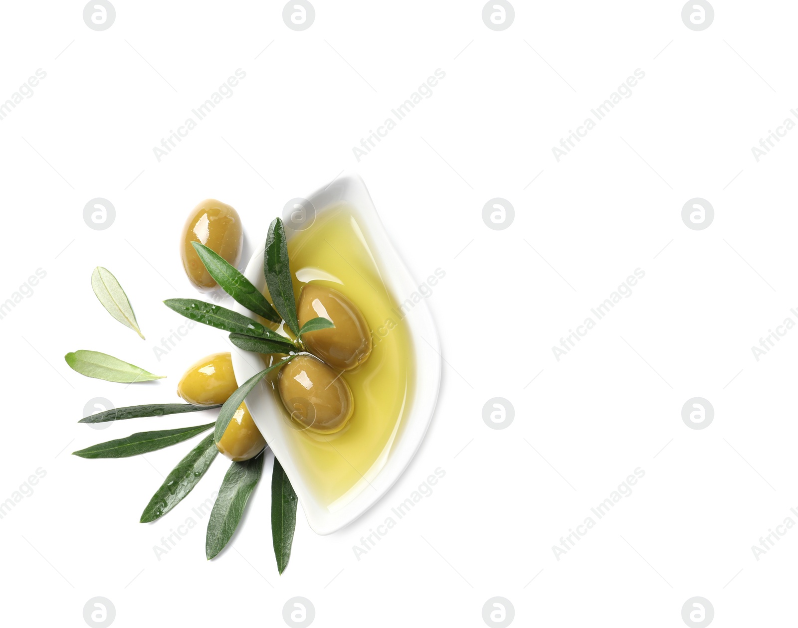 Photo of Dish with oil, olives and leaves on white background