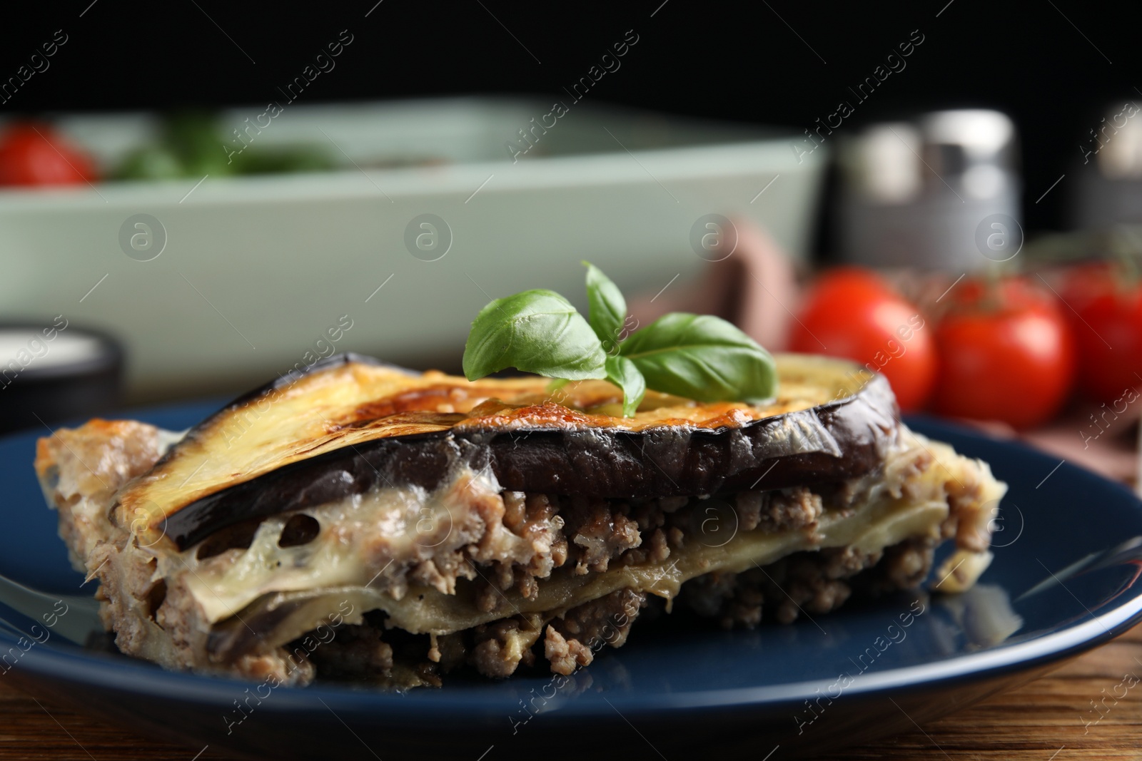 Photo of Plate of delicious eggplant lasagna on table, closeup