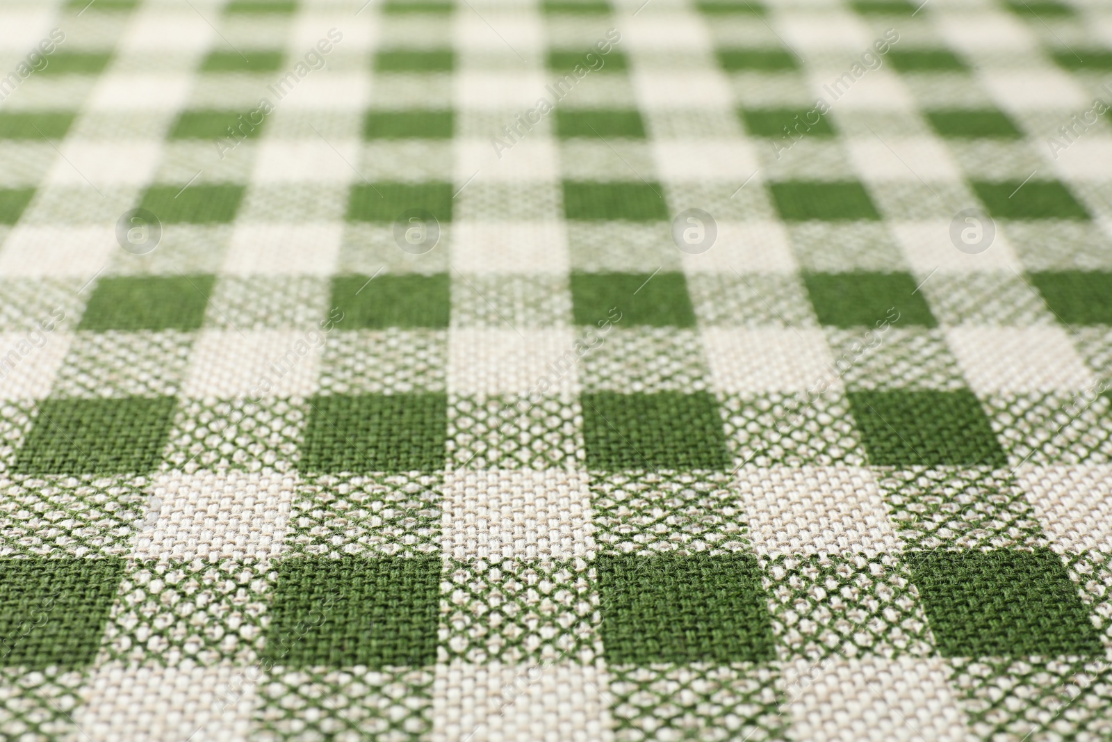 Photo of Texture of checkered fabric as background, closeup