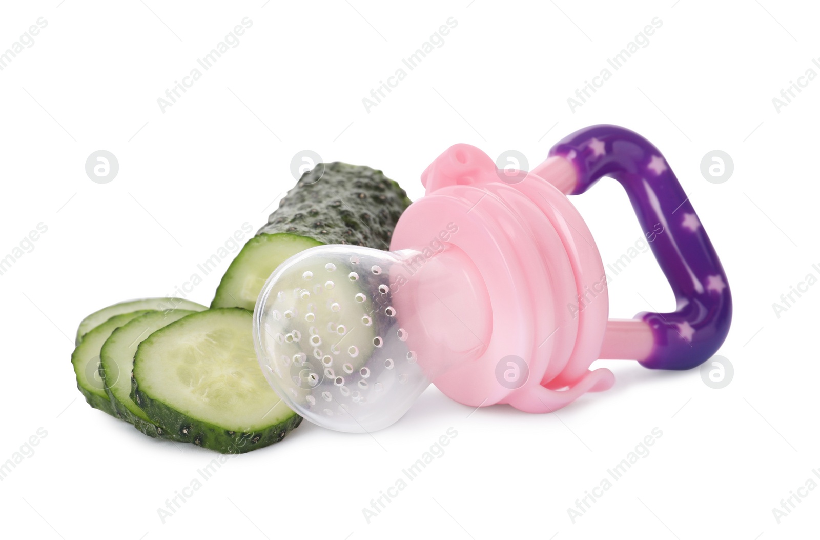 Photo of Empty nibbler and cut cucumber on white background. Baby feeder