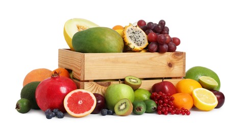 Photo of Many different fresh fruits and wooden crate isolated on white