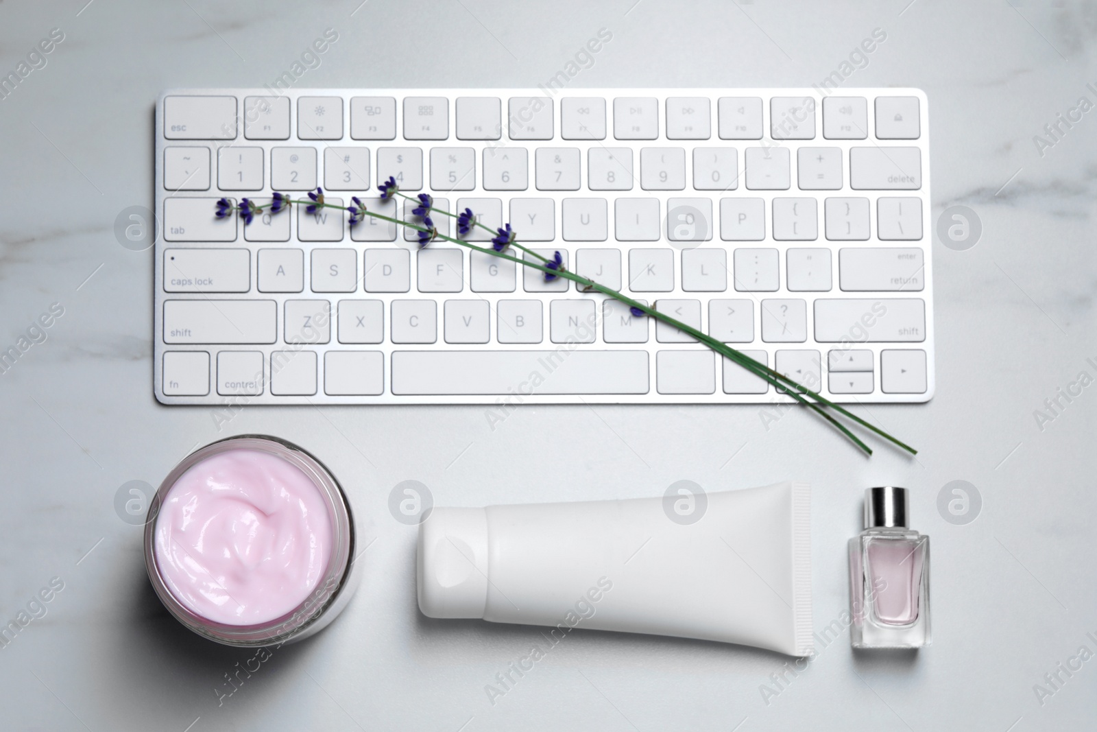 Photo of Flat lay composition with different hand care cosmetic products on white table