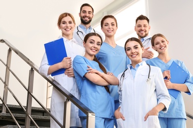 Photo of Group of medical doctors at clinic. Unity concept