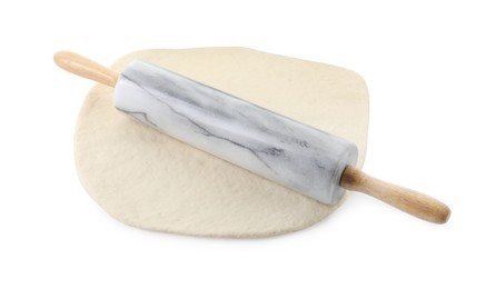 Raw dough and rolling pin isolated on white