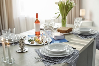 Photo of Table served for Passover (Pesach) Seder indoors