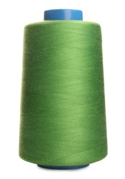 Photo of Spool of green sewing thread isolated on white