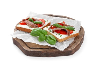 Photo of Delicious sandwiches with cream cheese, anchovies, tomatoes and basil on white background