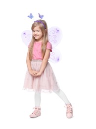 Cute little girl in fairy costume with violet wings on white background
