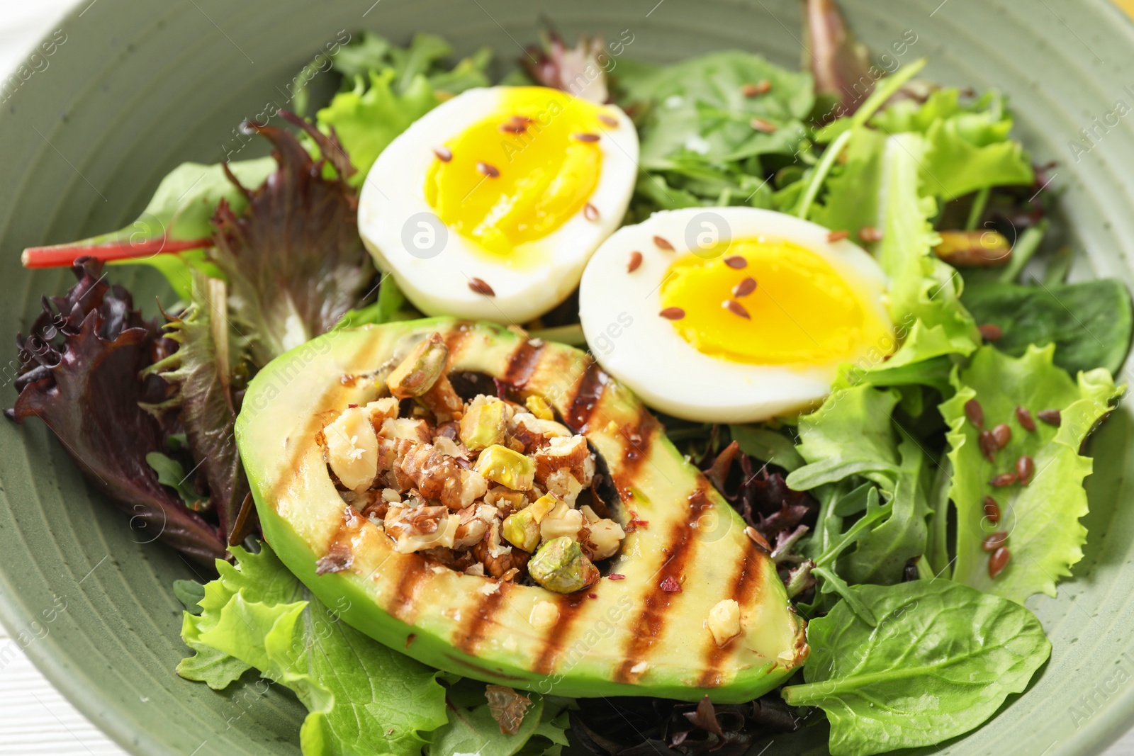 Photo of Healthy dish high in vegetable fats in bowl, closeup