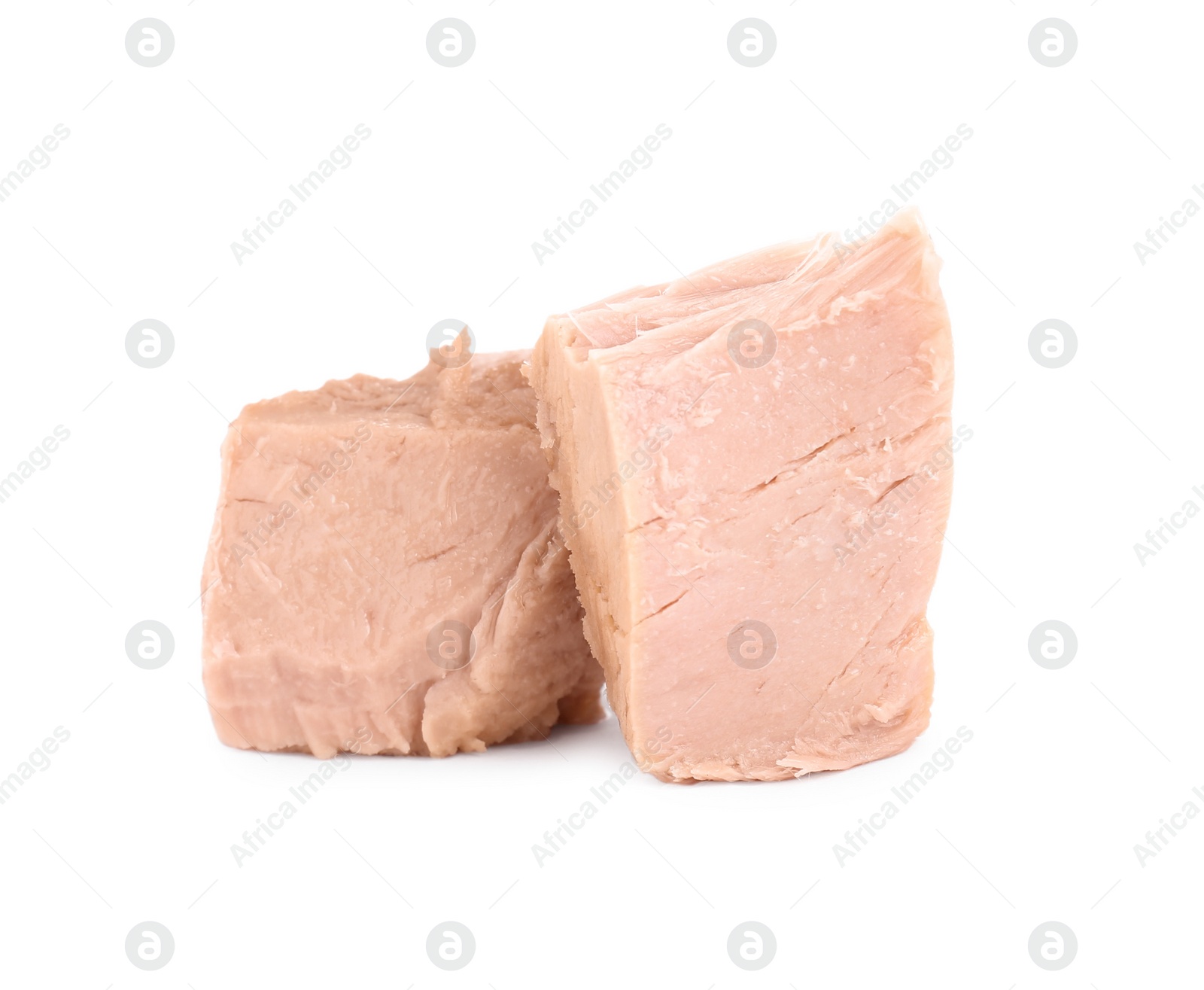 Photo of Delicious canned tuna chunks isolated on white