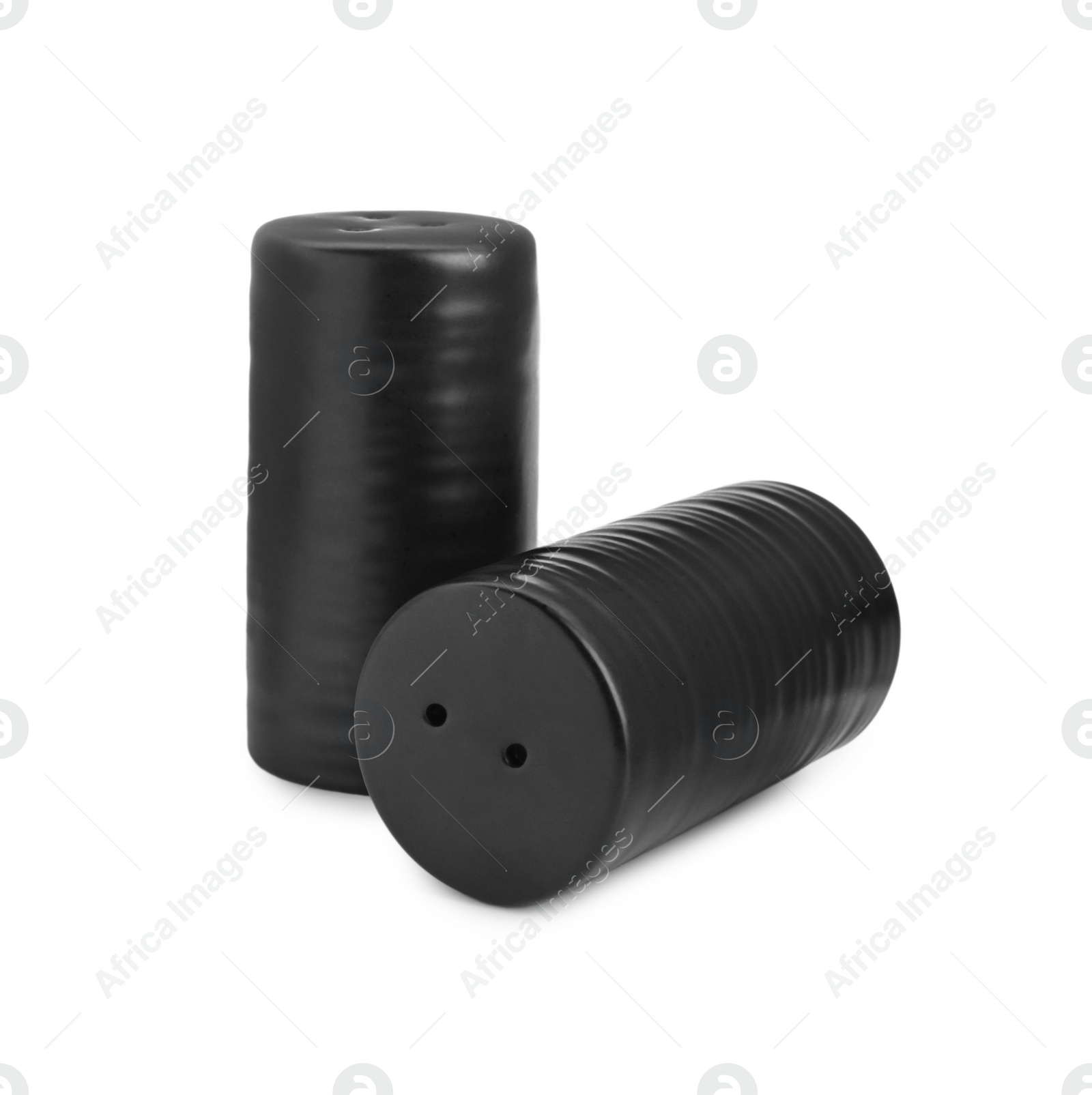 Photo of Black salt and pepper shakers isolated on white