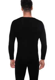 Man wearing thermal underwear isolated on white, back view