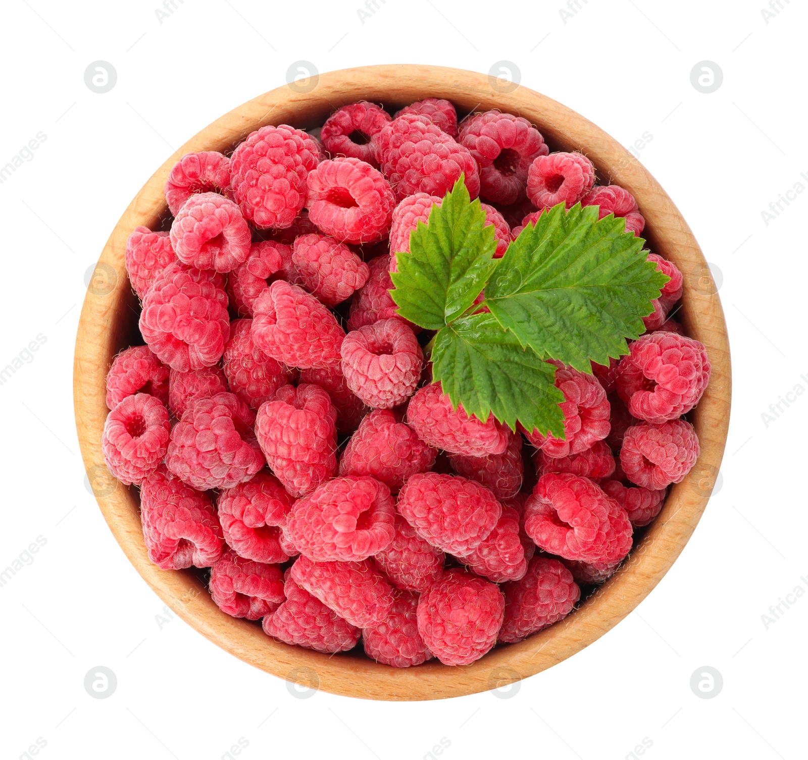 Photo of Bowl of delicious fresh ripe raspberries with leaves on white background, top view