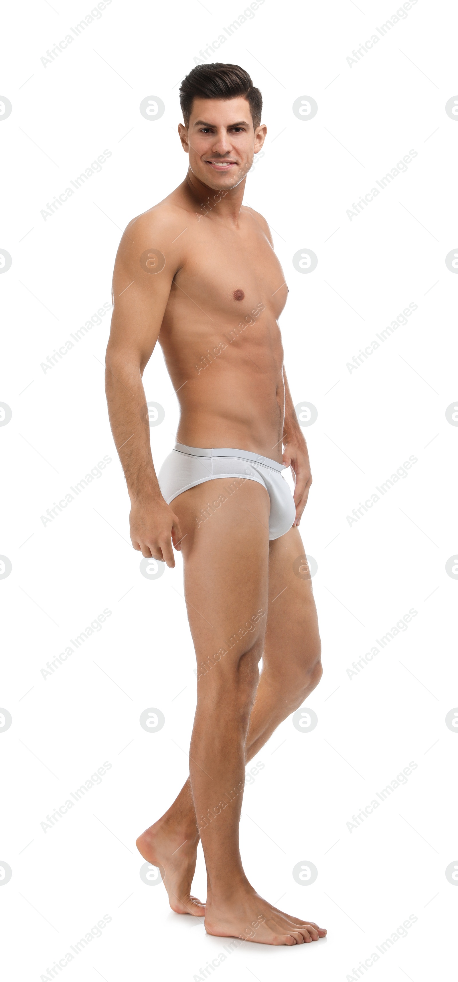 Photo of Handsome man in underwear on white background