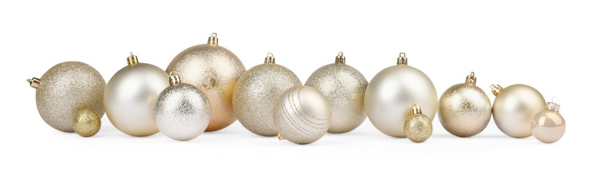 Beautiful golden Christmas balls isolated on white