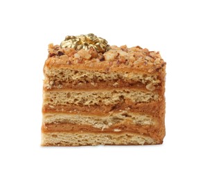 Photo of Piece of layered honey cake with walnuts on white background