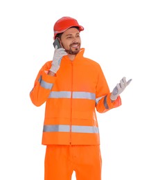 Man in reflective uniform talking on phone against white background