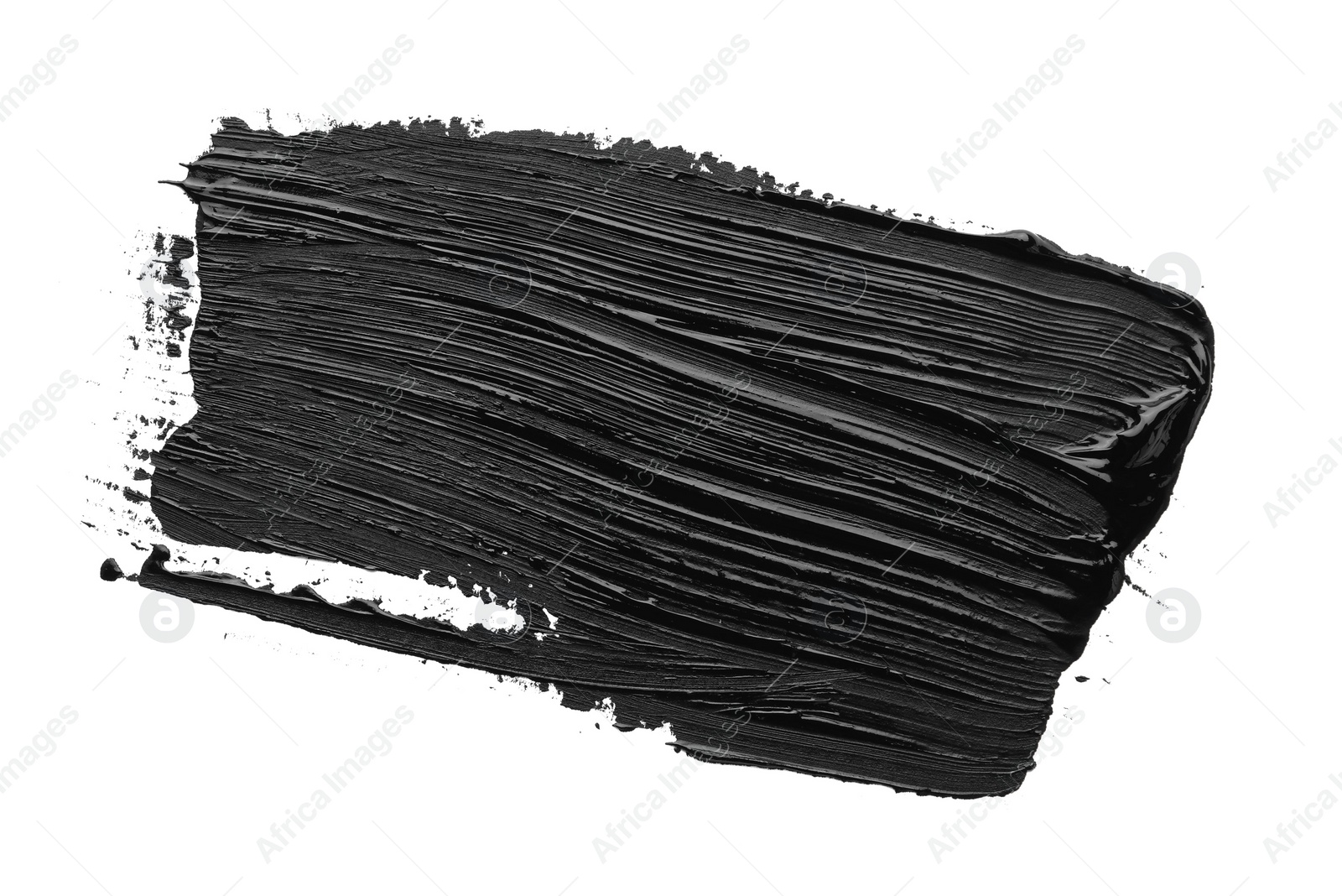 Photo of Brushstrokes of black oil paint on white background, top view