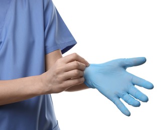 Doctor wearing light blue medical glove on white background, closeup