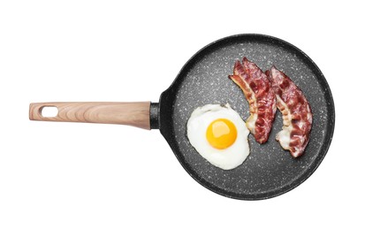 Photo of Frying pan with delicious fried egg and bacon isolated on white, top view