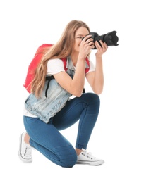 Female photographer with camera on white background