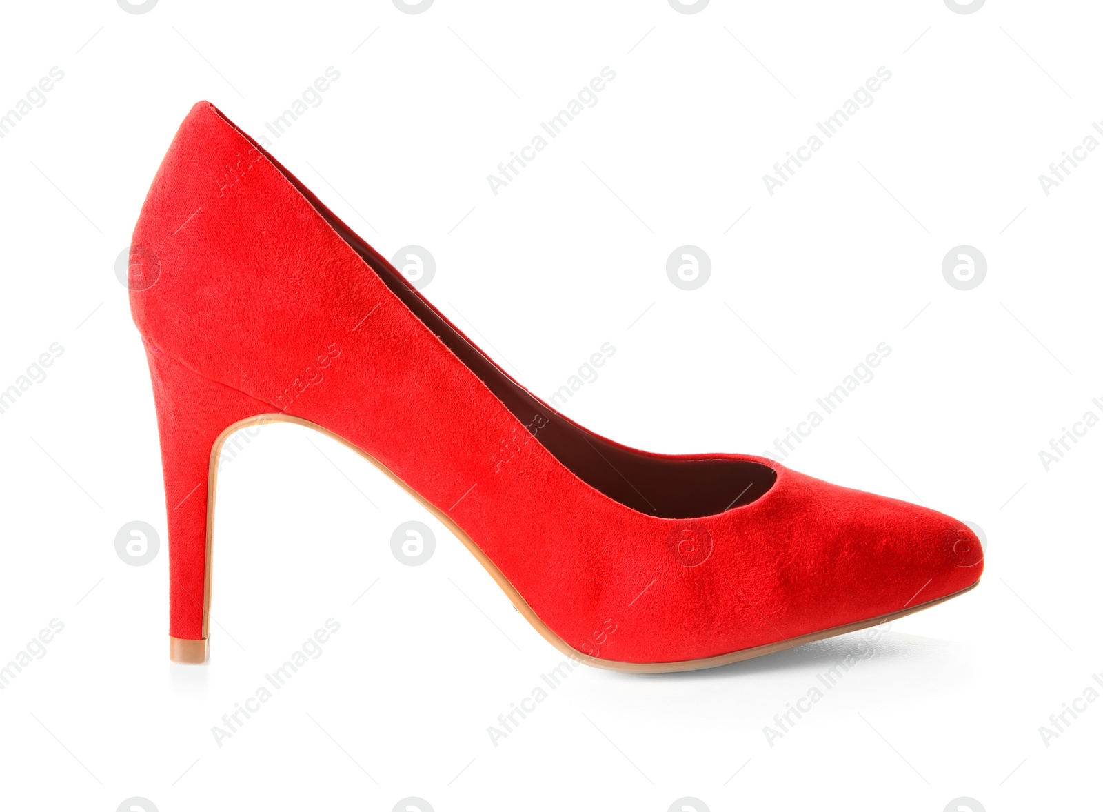 Photo of Red female shoe on white background