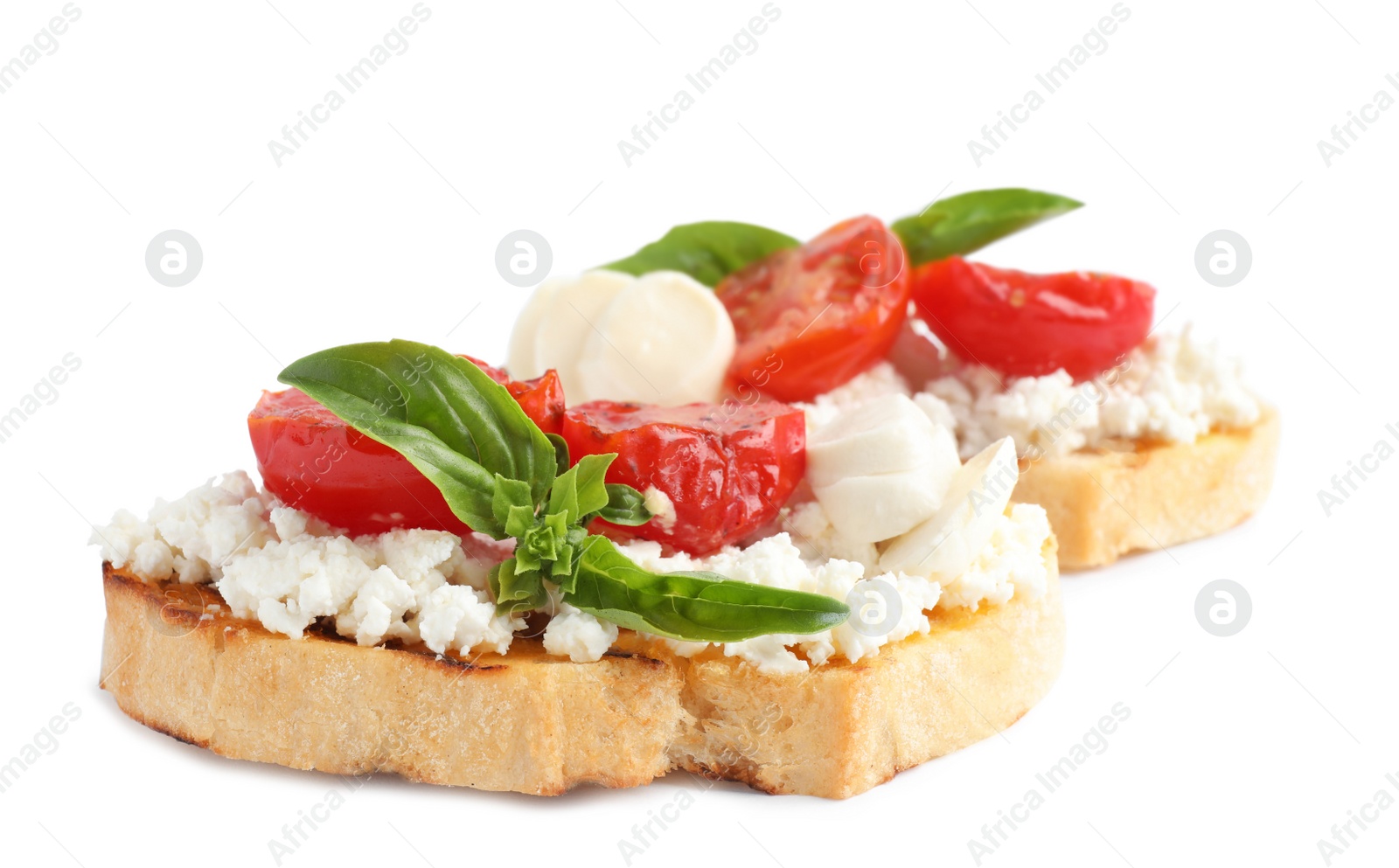 Photo of Tasty fresh tomato bruschettas on white background