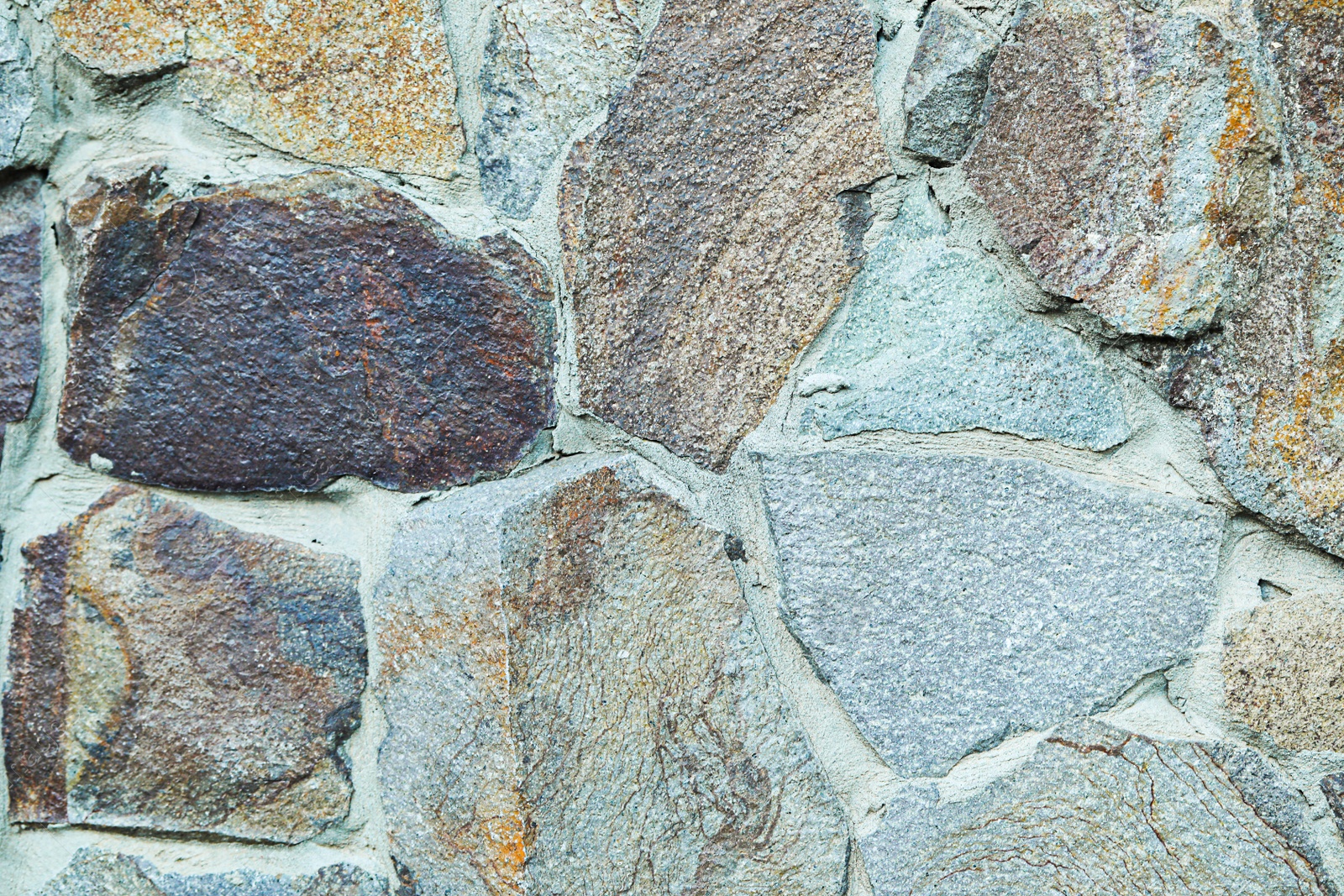 Photo of Stone surface as background, closeup. Seamless texture