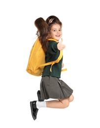 Photo of Little girl in stylish school uniform on white background