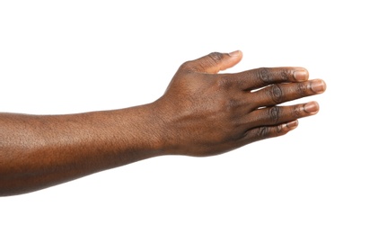 African-American man extending hand for shake on white background, closeup