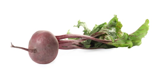 Raw ripe beet with leaves isolated on white