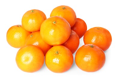 Photo of Many fresh ripe tangerines isolated on white