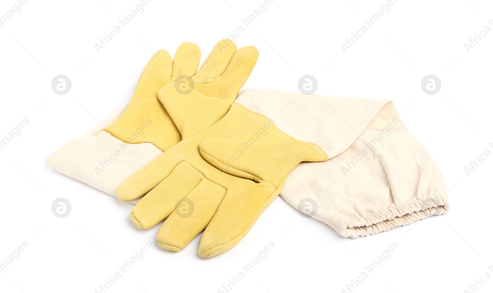 Photo of Protective gloves on white background. Safety equipment