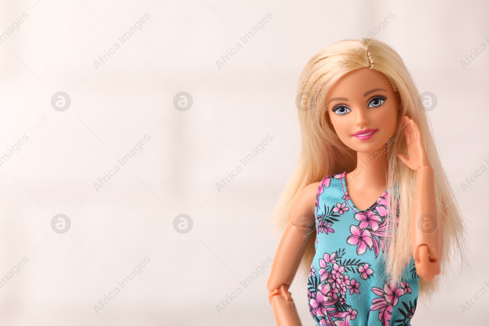 Photo of Mykolaiv, Ukraine - September 4, 2023: Beautiful Barbie doll on white background, space for text