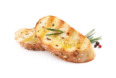 Photo of Tasty bruschettas with oil, rosemary and pepper on white background