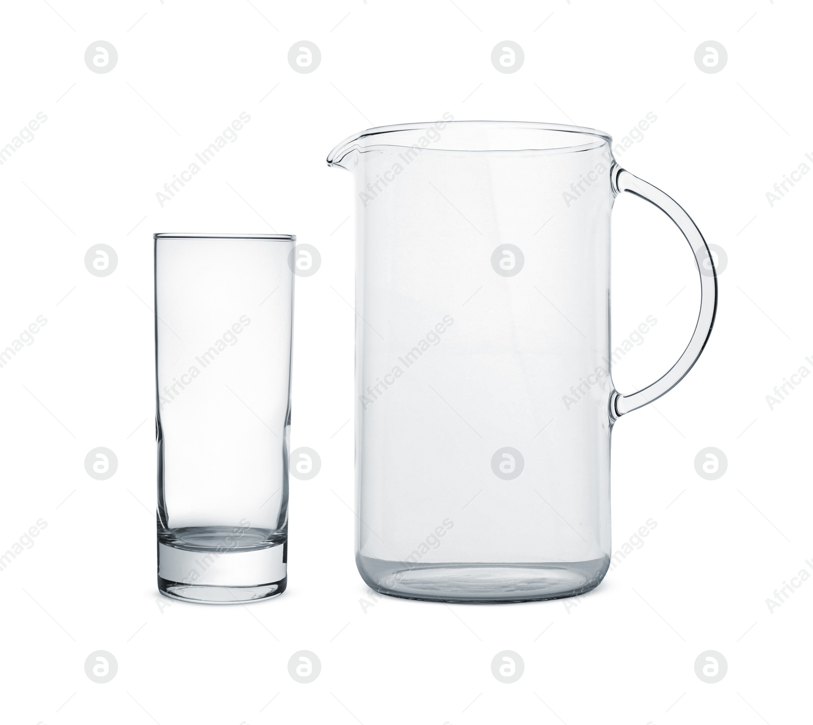 Image of Empty glass and jug isolated on white