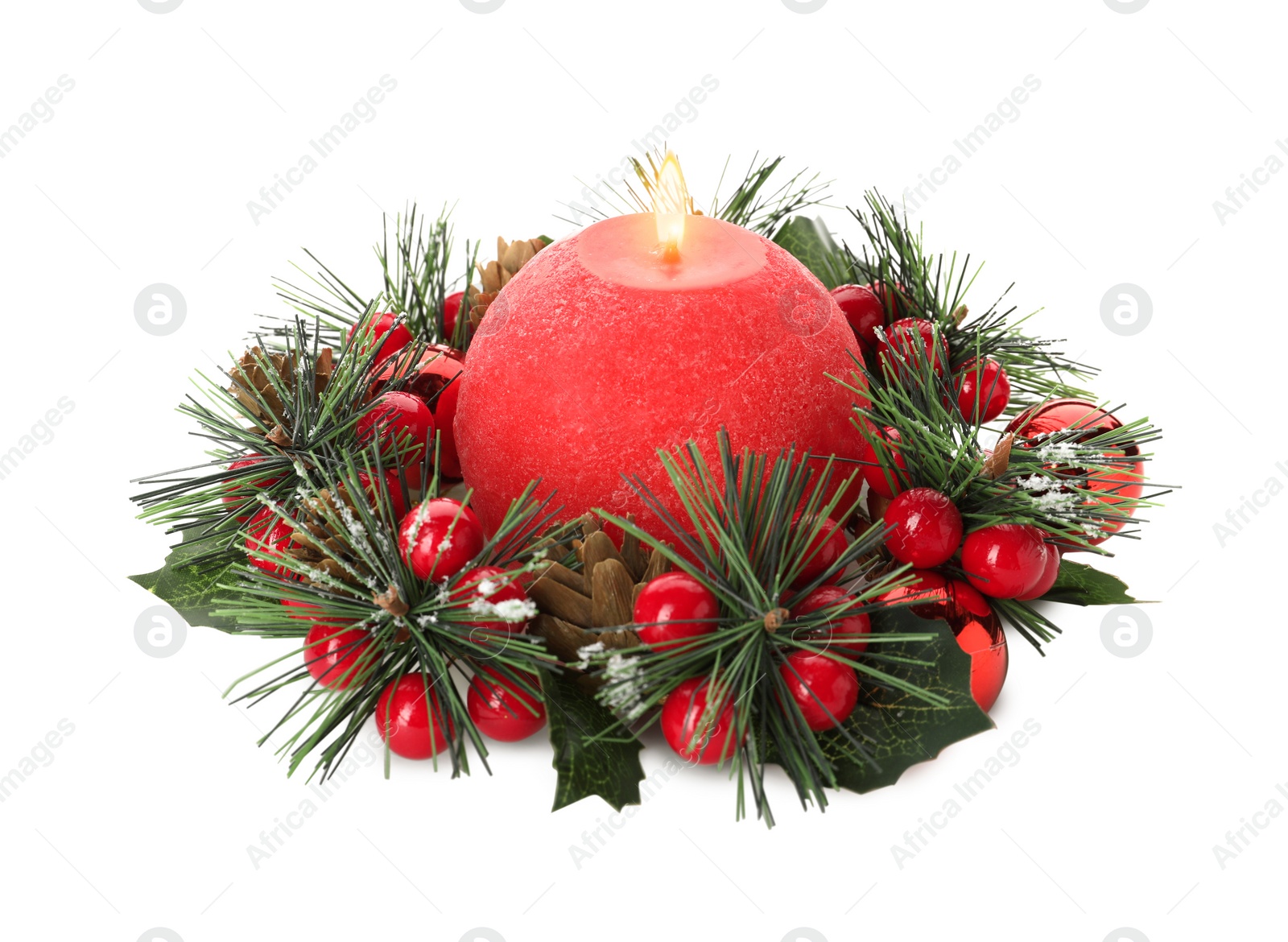 Photo of Burning red candle with Christmas decor isolated on white