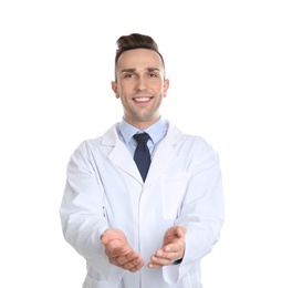 Photo of Male dentist holding something on white background
