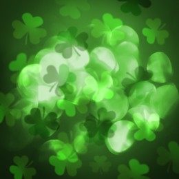 Image of St. Patrick's Day greeting card design with clover leaves, bokeh effect