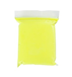 Package of yellow play dough on white background, top view