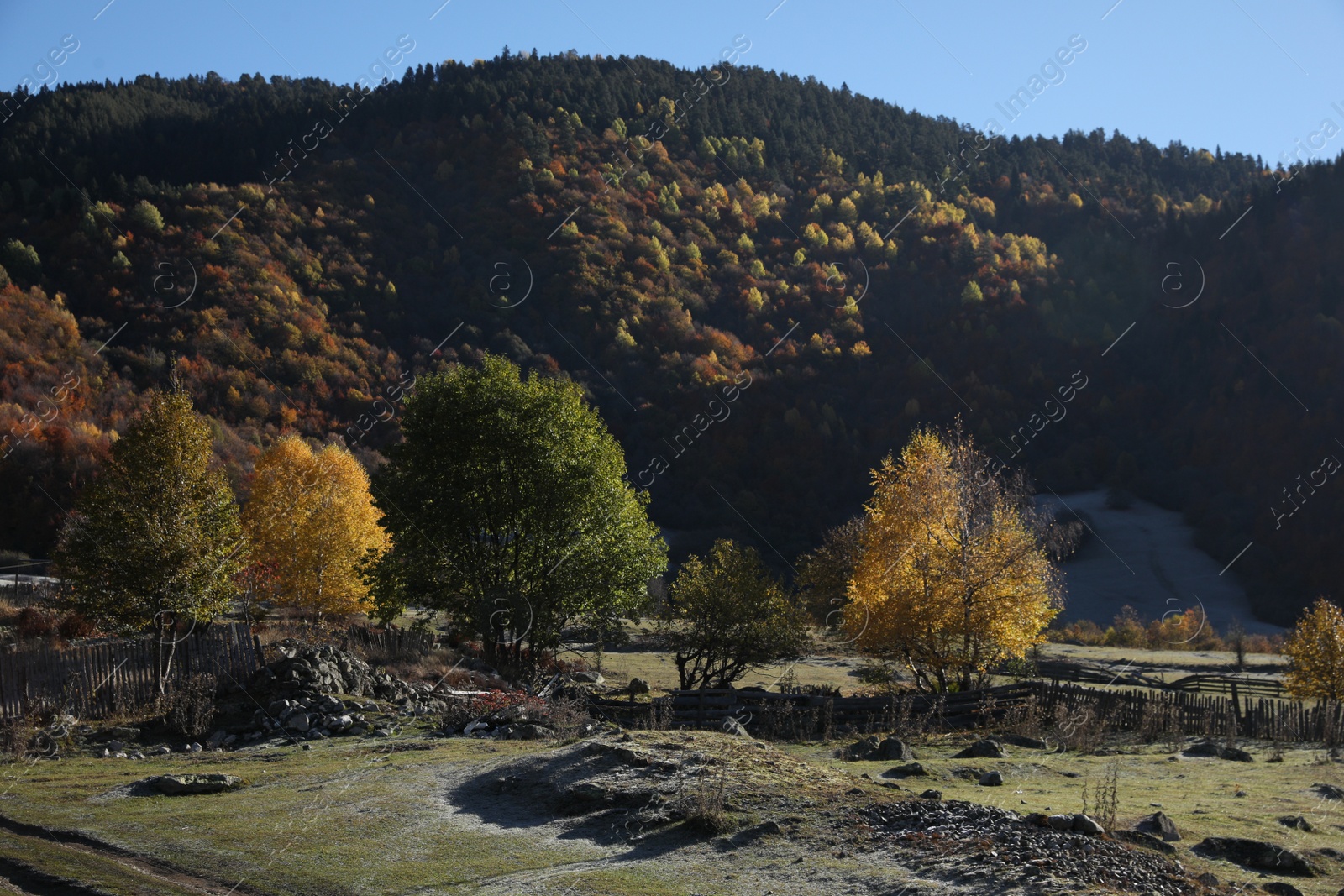 Photo of Picturesque view of high mountains on sunny day