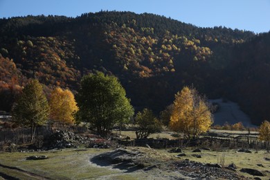 Picturesque view of high mountains on sunny day