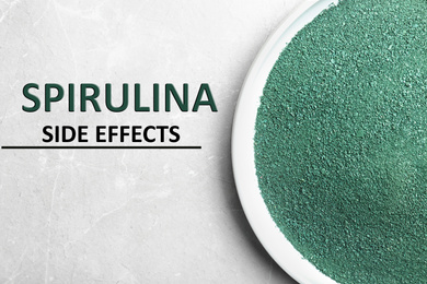 Plate of spirulina powder on light background, top view. Side effects
