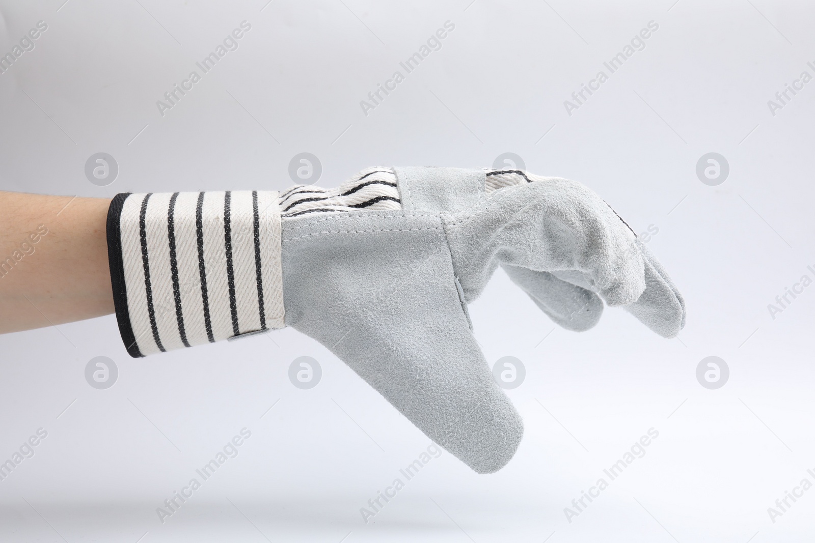 Photo of Woman in gardening glove on white background, closeup