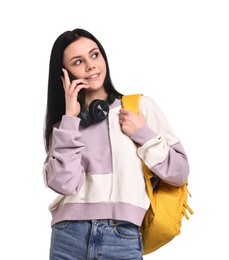 Photo of Smiling student talking by smartphone on white background