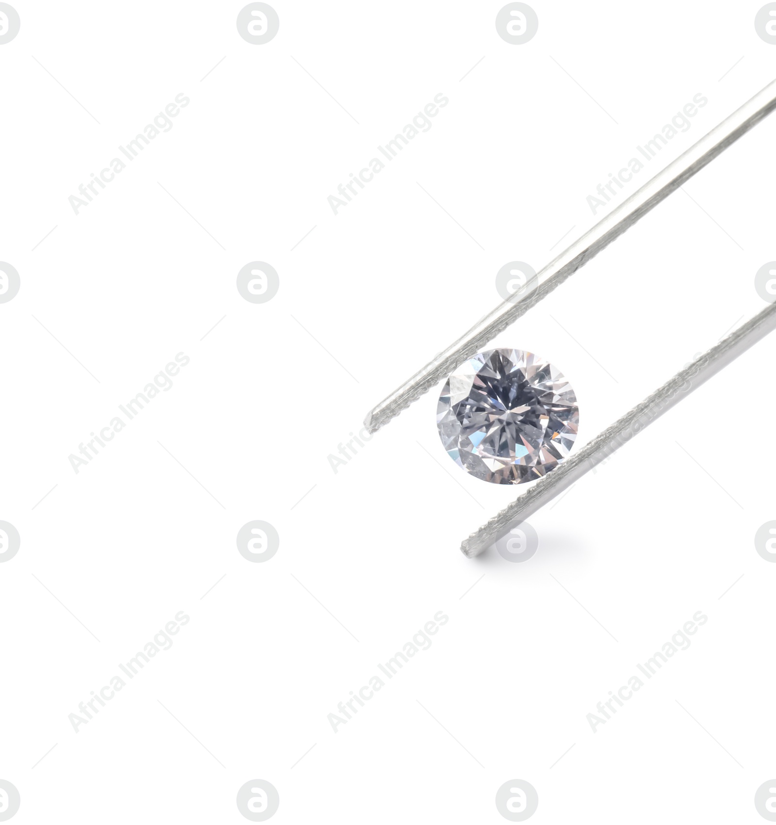 Photo of Tweezers with beautiful shiny diamond isolated on white