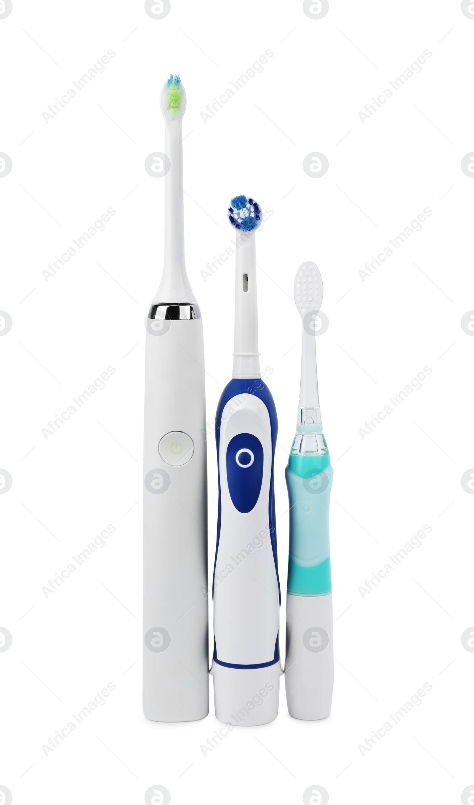 Photo of Electric toothbrushes on white background. Dental care