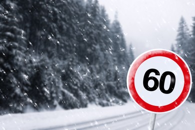 Image of Highway with Maximum Speed 60 road sign on snowy day, space for text