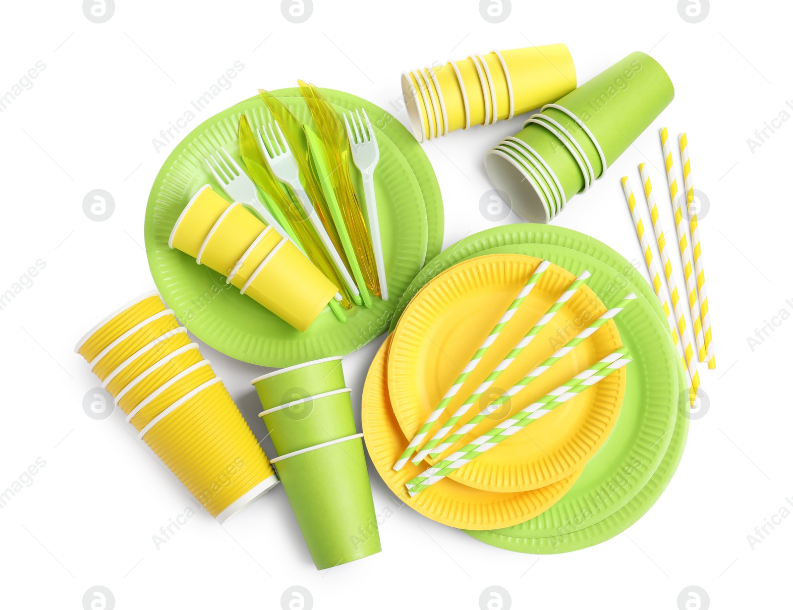 Photo of Set of disposable tableware on white background, top view